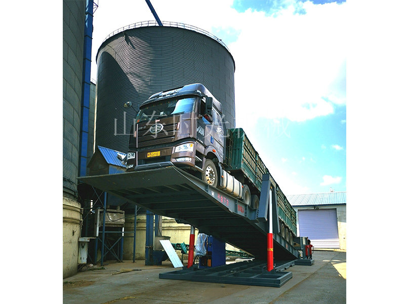 液压翻板卸车机